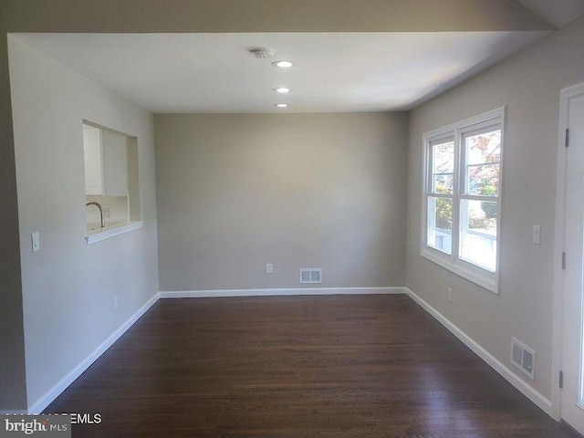 57 Turnberry Cir, Toms River, NJ 08753 - spare room featuring dark wood-style floors, recessed lighting, and a smoke detector
