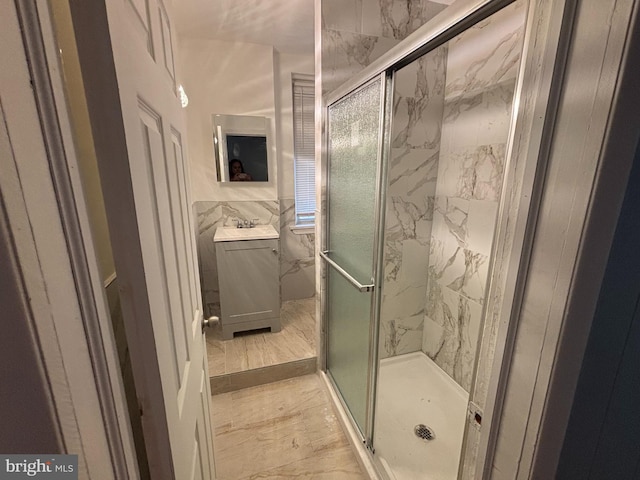 4066 Creston St, Philadelphia, PA 19135 - full bathroom featuring vanity, a shower stall, and tile walls