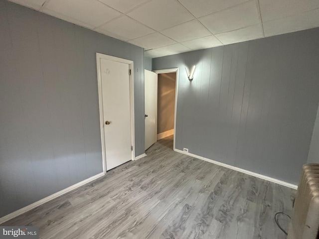 4066 Creston St, Philadelphia, PA 19135 - empty room featuring a drop ceiling and wood finished floors