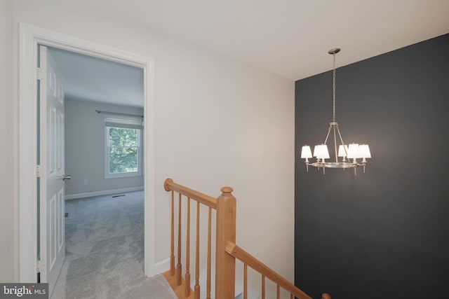 6110 Joust Ln, Alexandria, VA 22315 - corridor with an upstairs landing, a chandelier, and light carpet