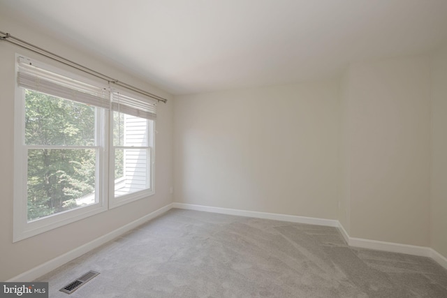 6110 Joust Ln, Alexandria, VA 22315 - spare room with light colored carpet and healthy amount of natural light