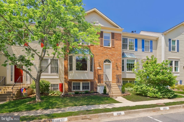 6110 Joust Ln, Alexandria, VA 22315 - multi unit property featuring brick siding and a front lawn