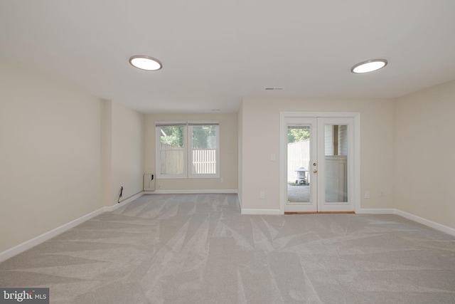 6110 Joust Ln, Alexandria, VA 22315 - empty room with french doors and light carpet
