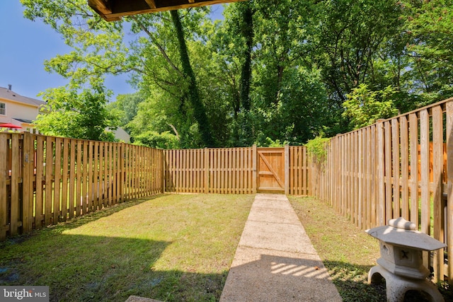 6110 Joust Ln, Alexandria, VA 22315 - fenced backyard featuring a gate