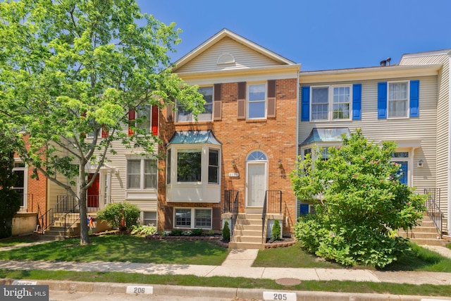 6110 Joust Ln, Alexandria, VA 22315 - townhome / multi-family property featuring brick siding