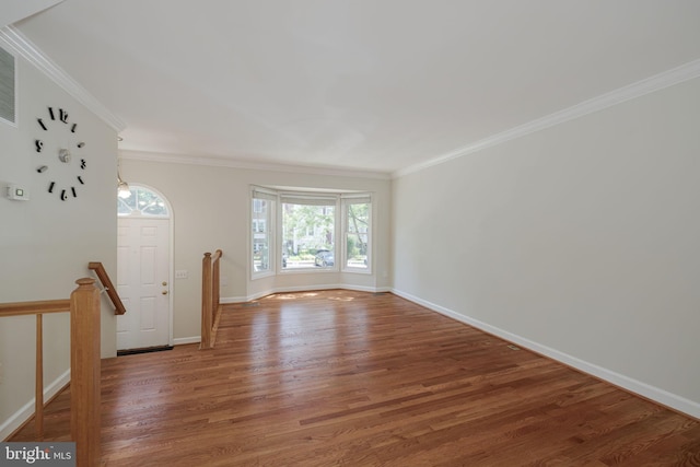 6110 Joust Ln, Alexandria, VA 22315 - spare room with wood finished floors and crown molding