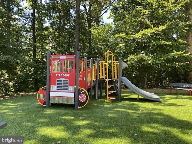 6110 Joust Ln, Alexandria, VA 22315 - community play area featuring a yard and view of scattered trees