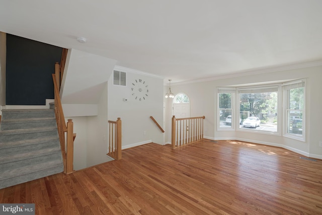 6110 Joust Ln, Alexandria, VA 22315 - empty room featuring wood finished floors and ornamental molding