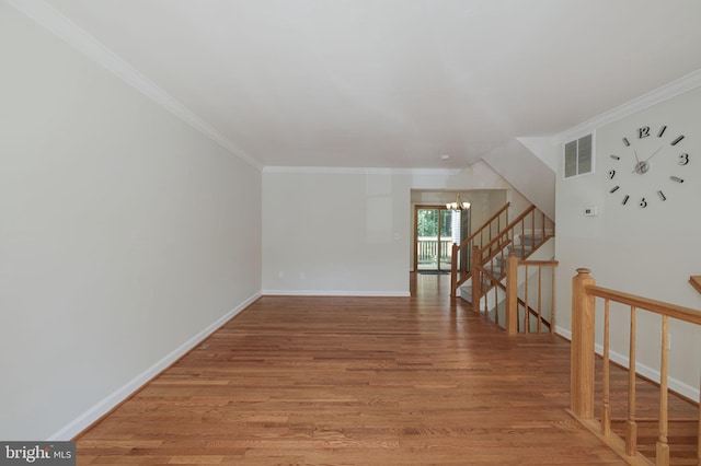 6110 Joust Ln, Alexandria, VA 22315 - additional living space with a chandelier, light wood-type flooring, and stairway