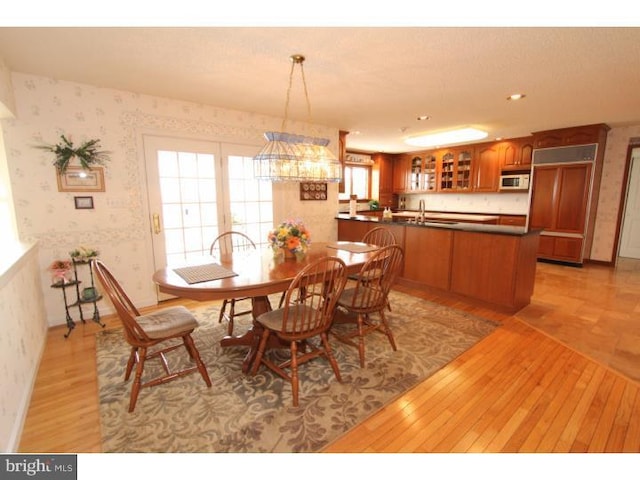 540 Hain Rd, Sinking Spring, PA 19608 - dining area featuring wallpapered walls and light wood-style flooring
