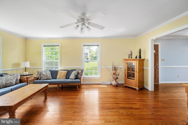 15 Tally Ho Dr, Fredericksburg, VA 22405 - living area with wood finished floors, crown molding, and a ceiling fan