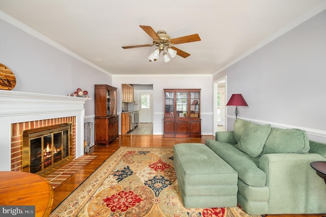 15 Tally Ho Dr, Fredericksburg, VA 22405 - living room featuring a ceiling fan, light wood-type flooring, crown molding, and a fireplace