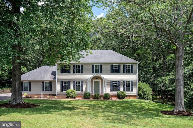 15 Tally Ho Dr, Fredericksburg, VA 22405 - colonial inspired home with a front yard and roof with shingles