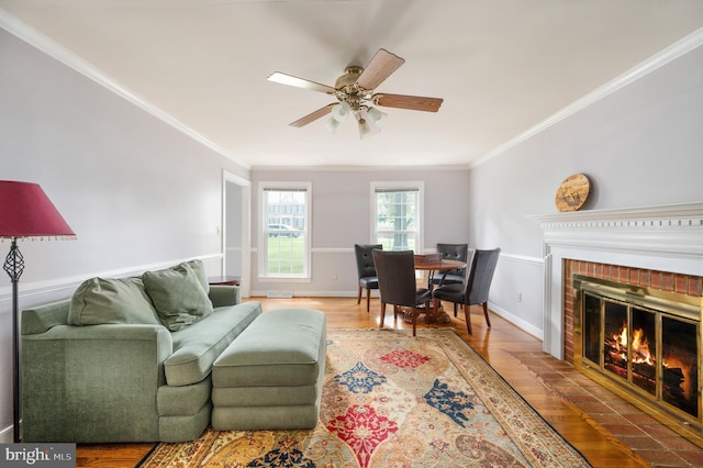 15 Tally Ho Dr, Fredericksburg, VA 22405 - living area featuring ornamental molding, ceiling fan, a fireplace, and wood finished floors