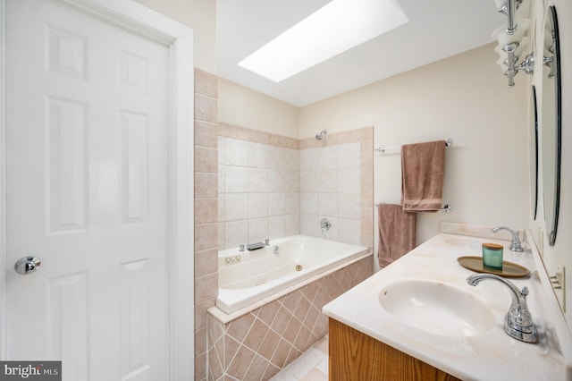15 Tally Ho Dr, Fredericksburg, VA 22405 - bathroom with double vanity, tiled shower / bath, and a skylight