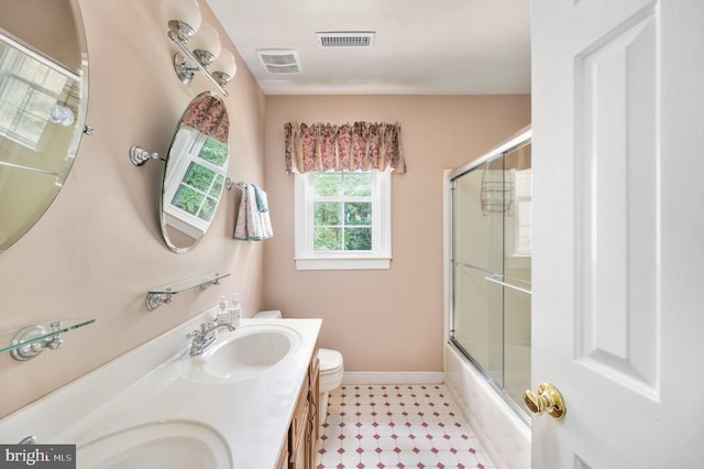 15 Tally Ho Dr, Fredericksburg, VA 22405 - bathroom featuring double vanity and bath / shower combo with glass door