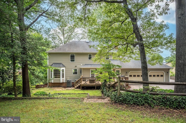 15 Tally Ho Dr, Fredericksburg, VA 22405 - rear view of property featuring a yard, a wooden deck, a garage, and a shingled roof