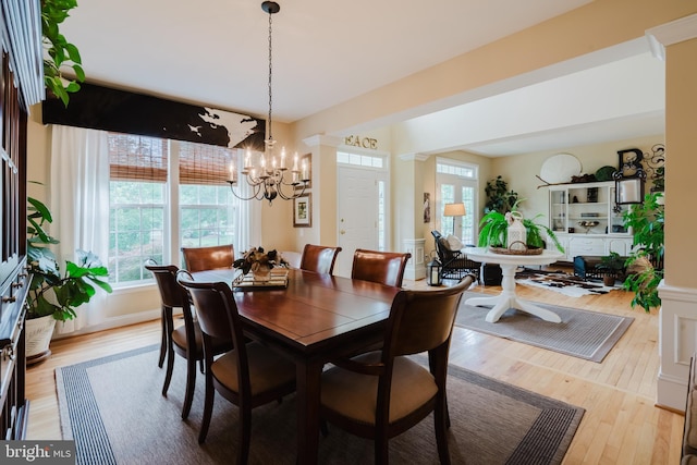 56 Willow Grove Mill Dr, Middletown, DE 19709 - dining room featuring a chandelier and light wood-type flooring
