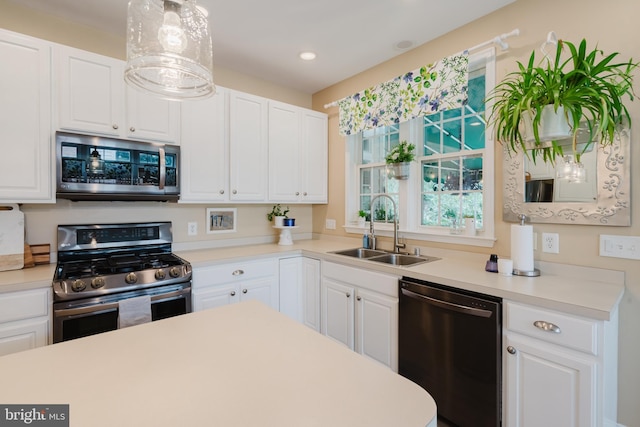 56 Willow Grove Mill Dr, Middletown, DE 19709 - kitchen featuring stainless steel appliances, white cabinetry, and recessed lighting