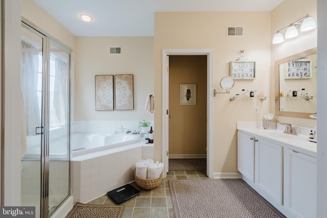 56 Willow Grove Mill Dr, Middletown, DE 19709 - bathroom with vanity, a bath, tile patterned flooring, and a shower stall
