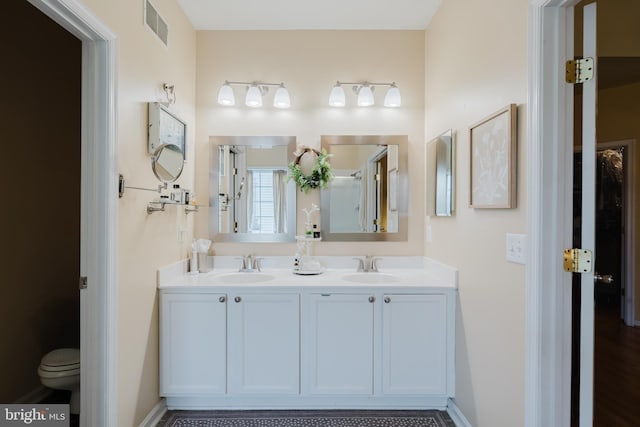 56 Willow Grove Mill Dr, Middletown, DE 19709 - bathroom with double vanity and toilet