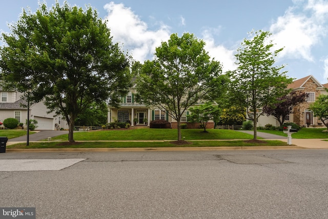 56 Willow Grove Mill Dr, Middletown, DE 19709 - obstructed view of property with a front lawn