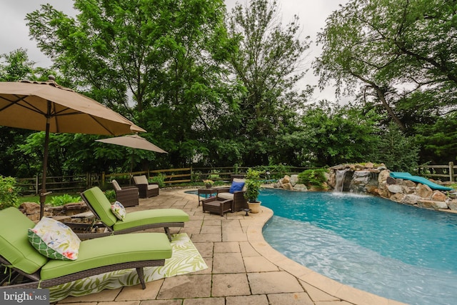 56 Willow Grove Mill Dr, Middletown, DE 19709 - view of swimming pool with a patio, outdoor lounge area, and view of wooded area