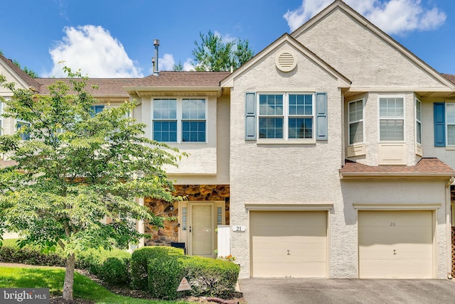 21 Viburnum Ct, Lafayette Hill, PA 19444 - multi unit property featuring a garage, driveway, and stucco siding