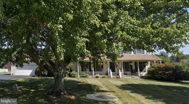 511 Chesterfield Arneytown Rd, Chesterfield, NJ 08515 - view of front facade featuring a porch, a garage, a front lawn, and asphalt driveway