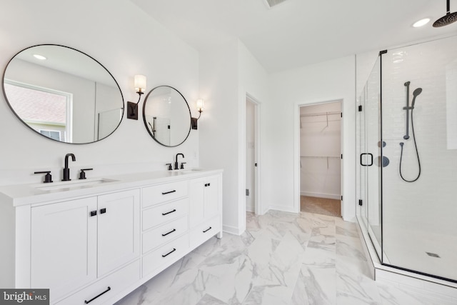 168 Tall Oak Dr, Felton, DE 19943 - full bathroom featuring a shower stall, double vanity, marble look tiles, a spacious closet, and recessed lighting