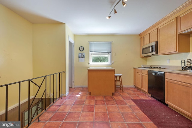 609 Apple Rd, Newark, DE 19711 - kitchen with dishwasher, stainless steel microwave, light countertops, dark tile patterned floors, and light brown cabinets