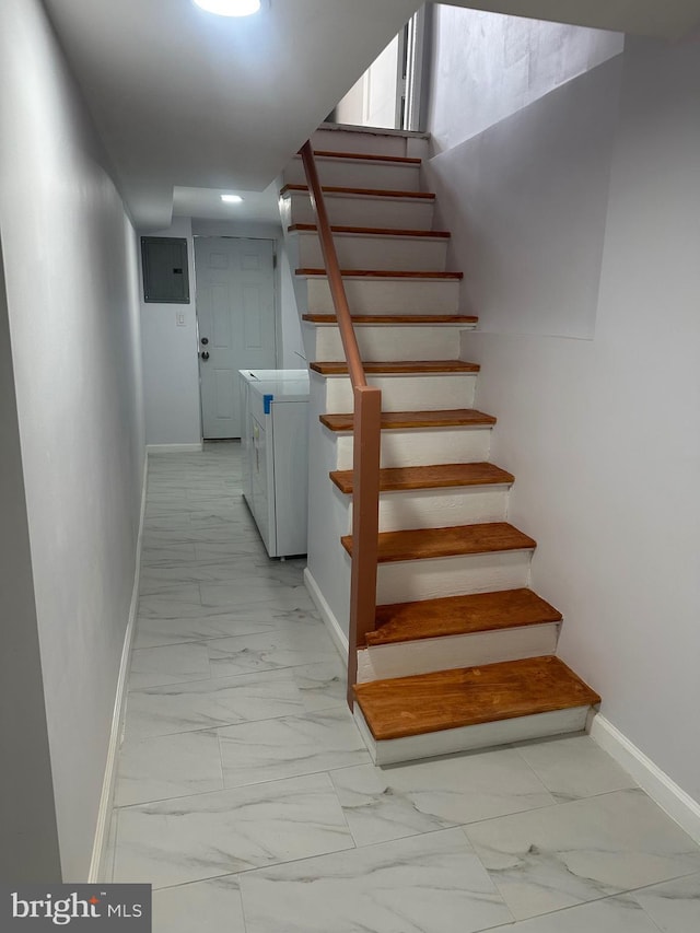 1333 Friendship St, Philadelphia, PA 19111 - staircase featuring marble finish floors, washer and clothes dryer, and electric panel