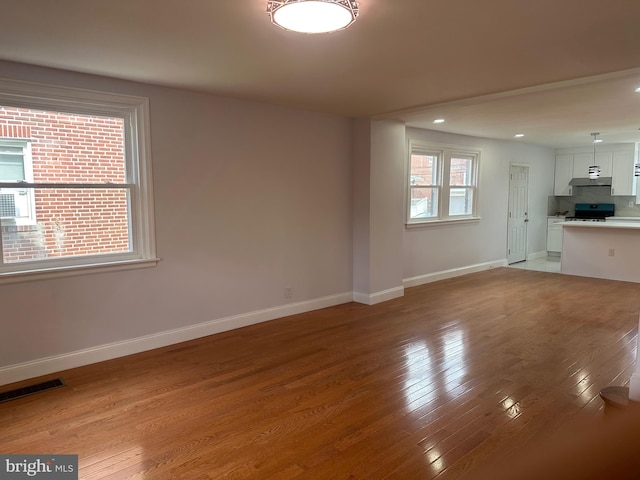 1333 Friendship St, Philadelphia, PA 19111 - unfurnished living room with light wood finished floors and recessed lighting