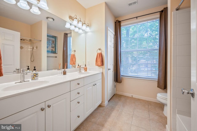 7 Booth St Unit 202, Gaithersburg, MD 20878 - bathroom featuring double vanity, tile patterned floors, and a shower