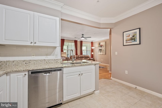 7 Booth St Unit 202, Gaithersburg, MD 20878 - kitchen with stainless steel dishwasher, crown molding, white cabinetry, ceiling fan, and light stone countertops