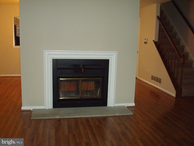 1704 Stoneham Dr, West Chester, PA 19382 - detailed view of a glass covered fireplace and wood finished floors