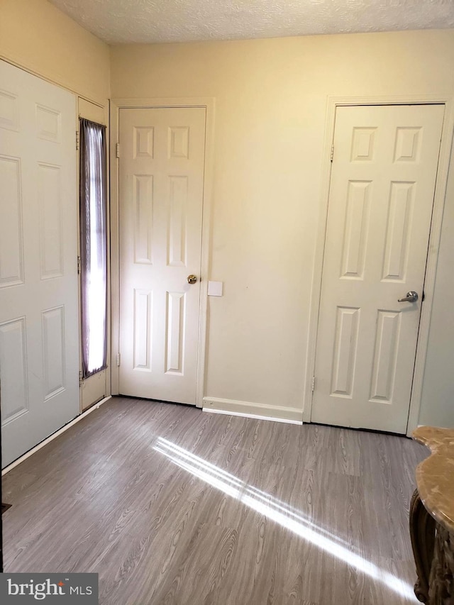 15021 Mcknew Rd, Burtonsville, MD 20866 - foyer with wood finished floors and baseboards