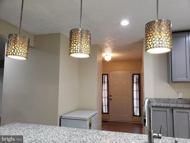 15021 Mcknew Rd, Burtonsville, MD 20866 - dining room featuring a textured ceiling and dark wood finished floors