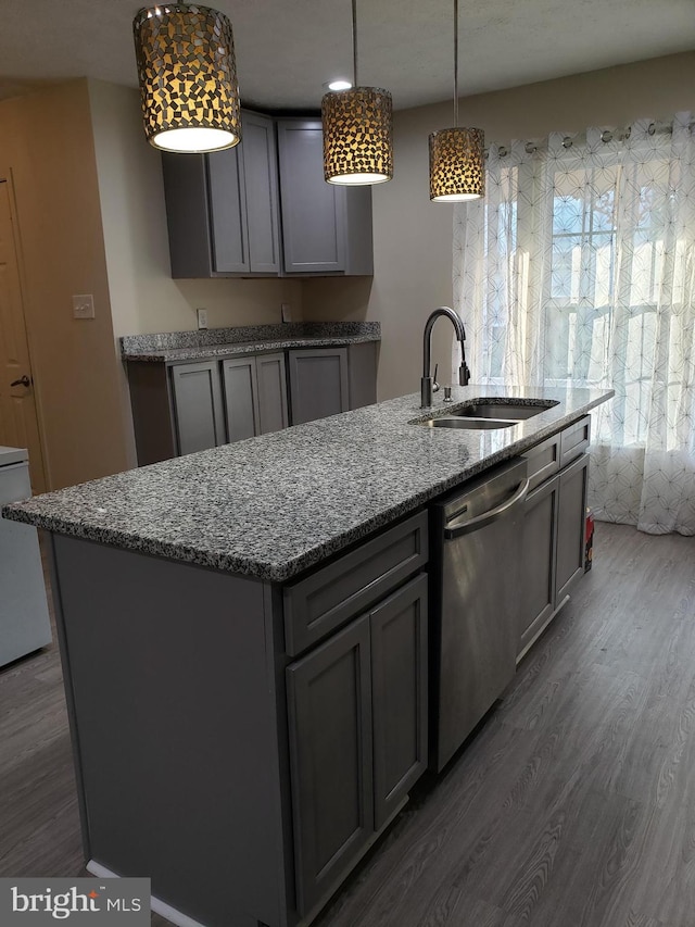 15021 Mcknew Rd, Burtonsville, MD 20866 - kitchen featuring dishwasher, dark wood-type flooring, stone countertops, and a kitchen island with sink