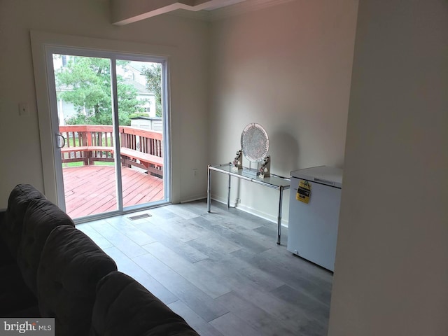 15021 Mcknew Rd, Burtonsville, MD 20866 - entryway with ornamental molding and light wood-type flooring