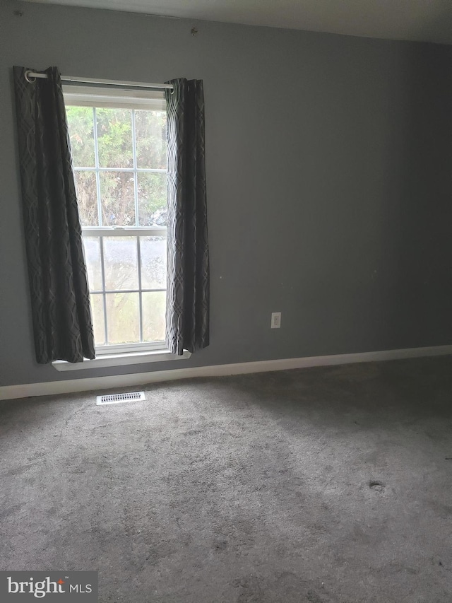 15021 Mcknew Rd, Burtonsville, MD 20866 - carpeted spare room with baseboards