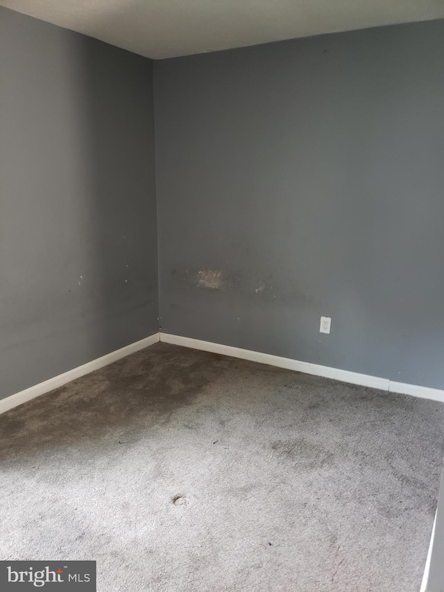 15021 Mcknew Rd, Burtonsville, MD 20866 - carpeted spare room with baseboards