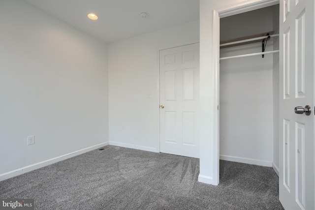 930 Washington Blvd, Baltimore, MD 21230 - unfurnished bedroom featuring carpet flooring, recessed lighting, and a closet