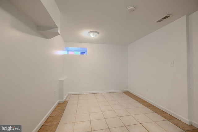 930 Washington Blvd, Baltimore, MD 21230 - unfurnished room with a smoke detector and light tile patterned flooring