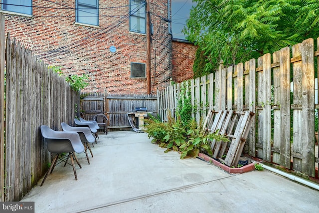 930 Washington Blvd, Baltimore, MD 21230 - fenced backyard with a patio area and grilling area