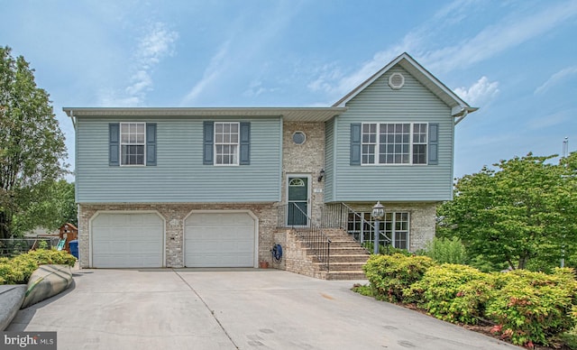 75 Westminster Dr, Front Royal, VA 22630 - raised ranch with concrete driveway and a garage