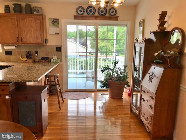 75 Westminster Dr, Front Royal, VA 22630 - doorway with light wood-style floors and a chandelier