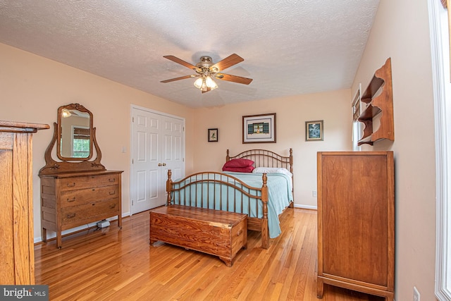 75 Westminster Dr, Front Royal, VA 22630 - bedroom with light wood finished floors, a textured ceiling, and ceiling fan
