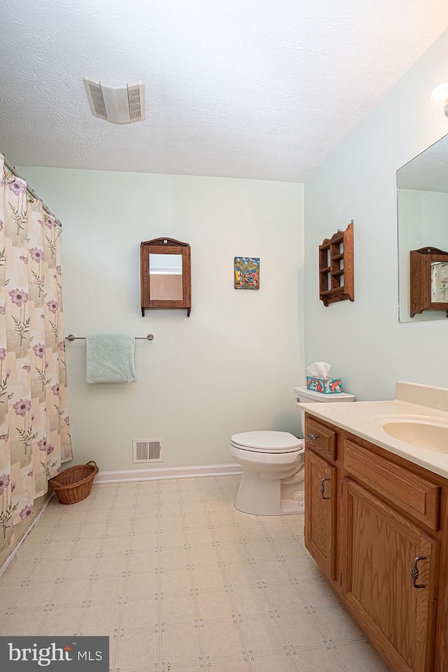 75 Westminster Dr, Front Royal, VA 22630 - full bathroom with tile patterned floors, vanity, a textured ceiling, and a shower with curtain