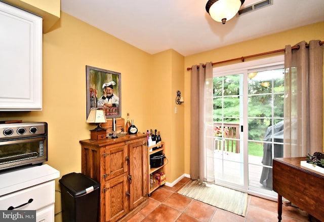 1015 Greenes Way Cir, Collegeville, PA 19426 - doorway with light tile patterned floors and baseboards